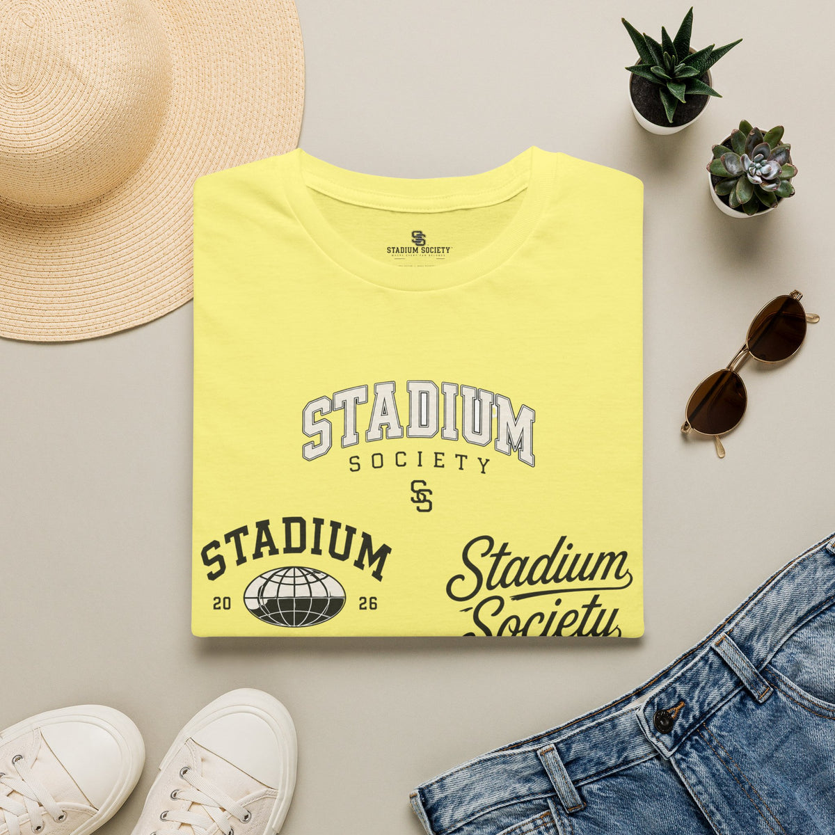Stadium Society Collegiate Logo Tee — Heritage — sand front